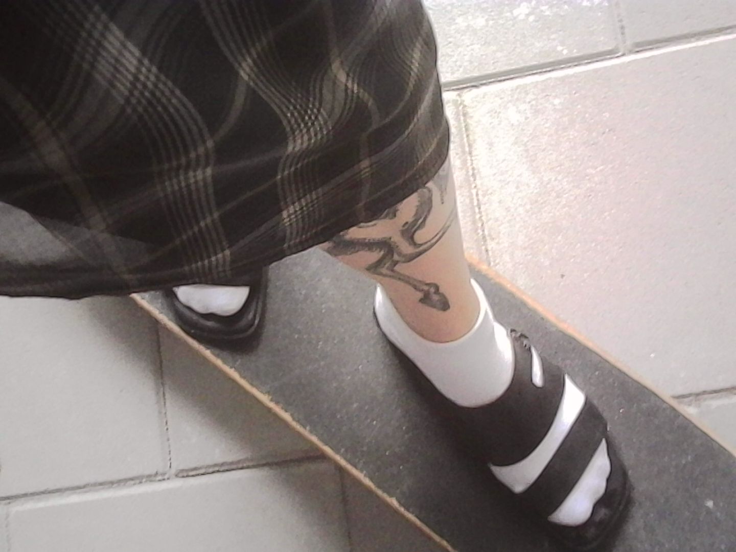 On a skateboard